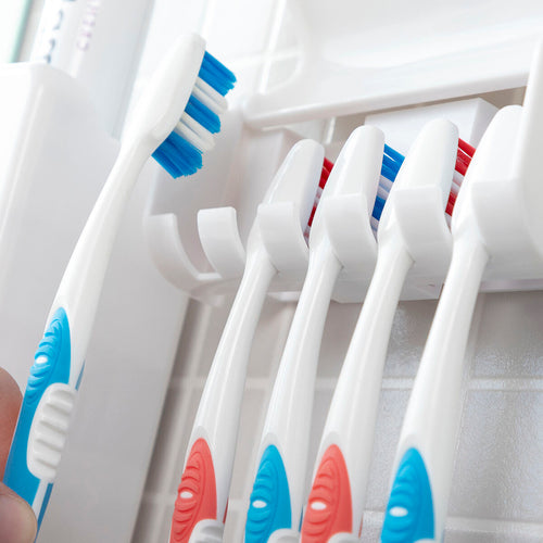 Toothpaste Dispenser & Toothbrush Holder